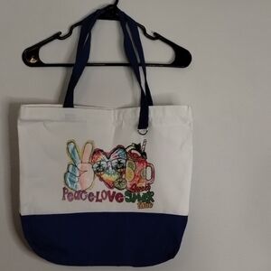 Chic White and Blue Canvas Tote with Playful Graphic